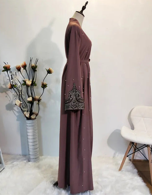 Timeless Beauty: Pearl-Adorned Abaya for Every Occasion