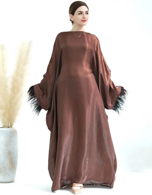 Enchanting Celebration: Feathered Abaya for Traditional Elegance