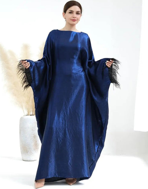 Enchanting Celebration: Feathered Abaya for Traditional Elegance