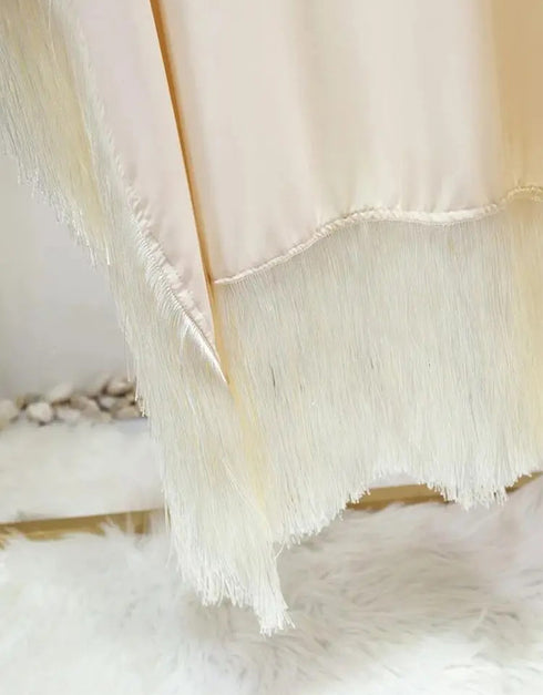 Timeless Grace: Tassel-Detailed Abaya for Effortless Elegance