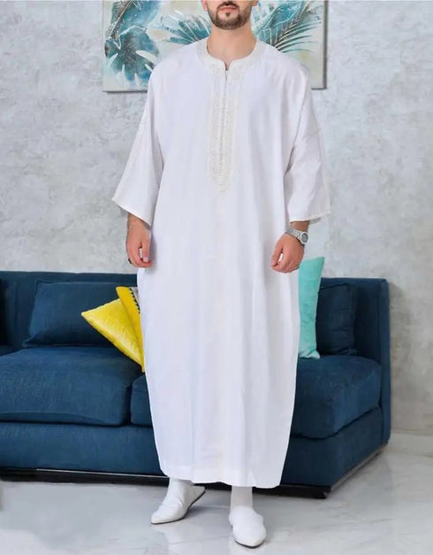 Distinctive Dubai Style: Elevate Your Look with Men's Muslim Jubba Thobe, featuring Patchwork Detailing and a Soft V-Neck Long Sleeve Design.