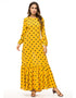 Dots and Drapes: A Dubai Abaya with a Global Flair
