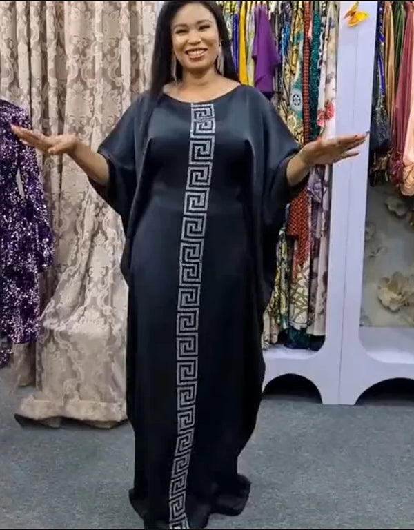 Where Tradition Meets Trend: Silk-Kissed Abaya Maxi in Bold African Print