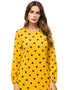 Dots and Drapes: A Dubai Abaya with a Global Flair