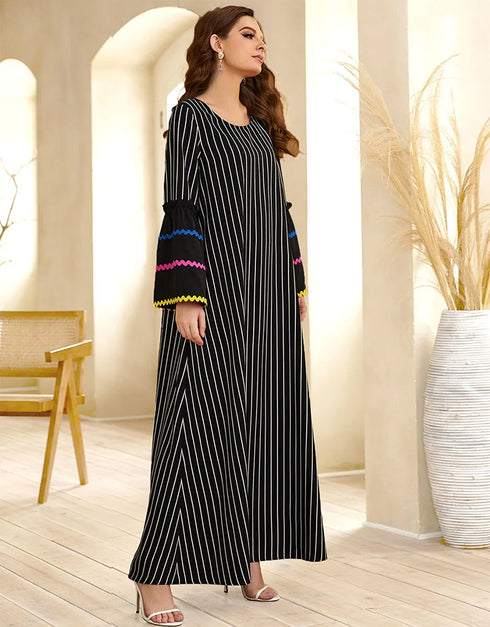 A Long Skirt Where Stripes Sing and Embroidery Dances