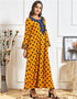 Whispers of Sun on Saffron: An Ethnically Embroidered Abaya for Casual Comfort