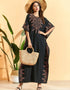 Embrace Bohemian Breezes: Embroidered Batwing Abaya with Flowing Pleated Skirt