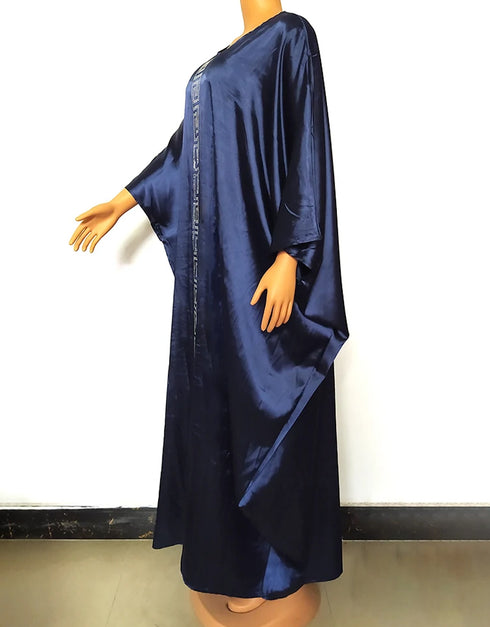 Where Tradition Meets Trend: Silk-Kissed Abaya Maxi in Bold African Print