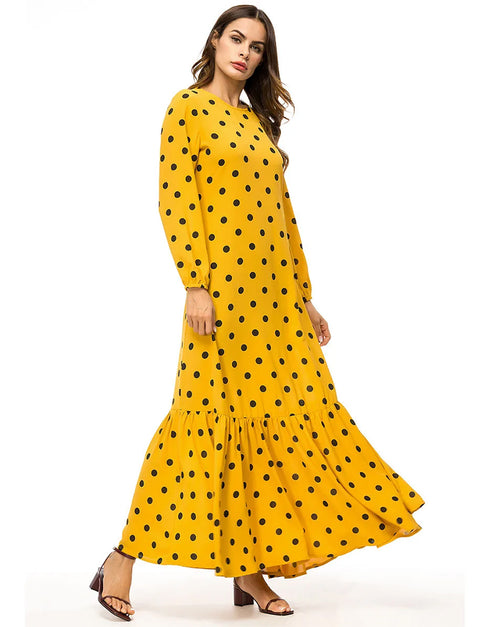 Dots and Drapes: A Dubai Abaya with a Global Flair
