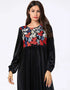 Midnight Bloom: A Cascading Black Abaya Embroidered with Golden Foliage