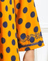 Whispers of Sun on Saffron: An Ethnically Embroidered Abaya for Casual Comfort