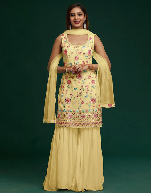 Yellow Sharara style Suit Faux Georgette Salwar Kameez in Embroidery, Mirror & Lace Work