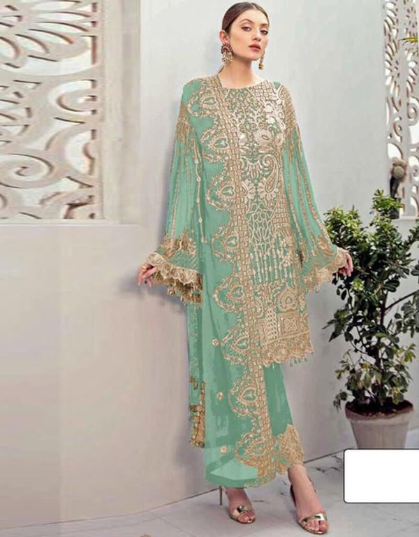 Turquoise Pant style Suits Georgette Salwar Kameez in Seqiuns Embroidery, Stone & Lace Work