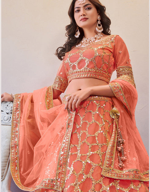 Exclusive Wedding Wear Heavy Lehenga Choli Collection Light Orange Net Lehenga Choli Close-up View