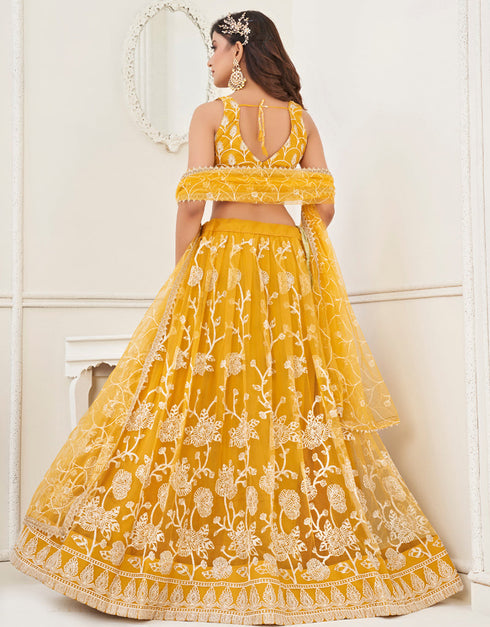Designer Wedding Wear Heavy Butterfly Net Lehenga Choli Collection Yellow Butterfly Net Lehenga Choli Close-up View
