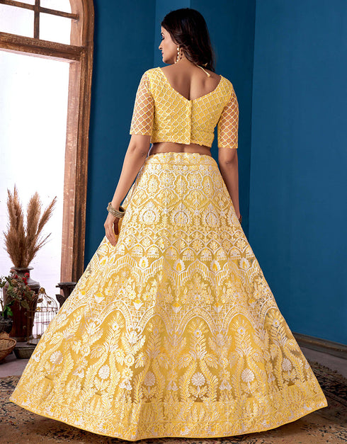 Traditional Function Wear Net Lehenga Choli Yellow Net Lehenga Choli Back View
