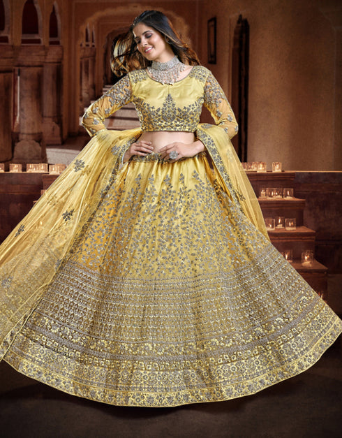 trendy yellow soft net traditional wear women's heavy lehenga choli collection with yellow soft net rt8964-185034 Close-up View