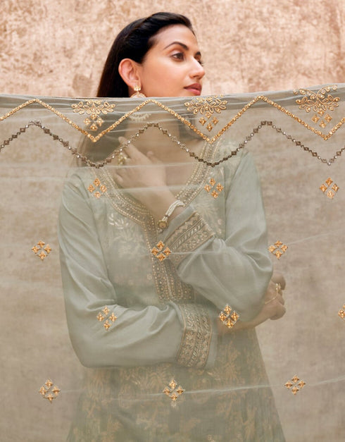 Pista Green Lehenga style Suits Dola Jacquard Silk Salwar Kameez in Embroidery, Stones & Lace Work Closure View
