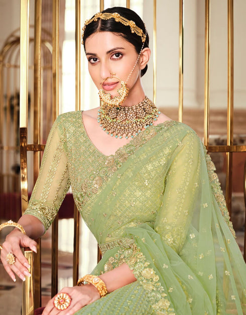 Light Green Lehenga style Suits Soft Net With Inner Salwar Kameez in Heavy Embroidery, Stone & Lace Work Closure View Embroidery