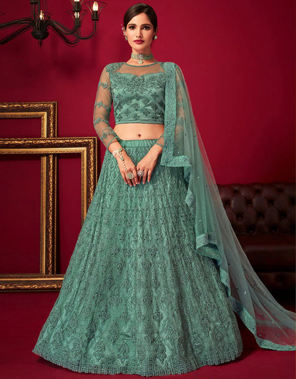 Designer Party Wear Velvet Lehenga Choli Collection Spanish Green Net And Silk Lehenga Choli Front View