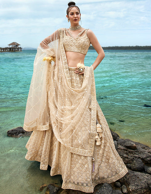 Designer Wedding Wear Heavy Net Lehenga Choli Collection Cream Net Lehenga Choli Close-up View