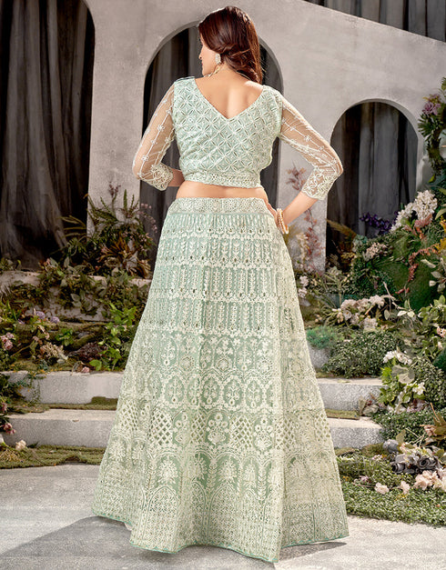 Designer Traditional Wedding Wear Lehenga Choli Pista Net Lehenga Choli Close-up View