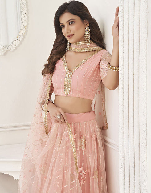 Designer Traditional Wedding Wear Lehenga Choli Peach Butterfly Net Lehenga Choli Back View