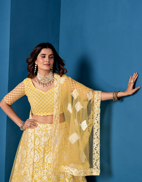 Designer Traditional Wedding Wear Lehenga Choli Yellow Net Lehenga Choli Back View