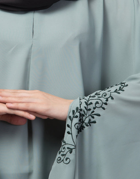 Modest Embroidered Irani Kaftan In Sage green Color Lifestyle Images