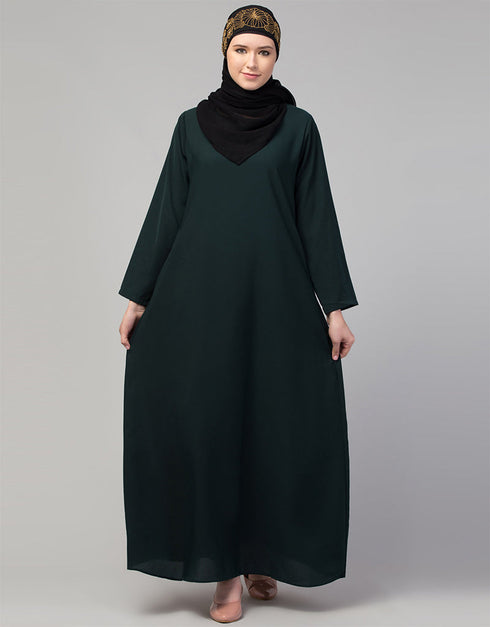 Muslim Basic abaya with a flared hem for a relaxed and stylish look In Color bottle green