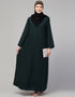 Muslim Basic abaya with a flared hem for a relaxed and stylish look In Color bottle green