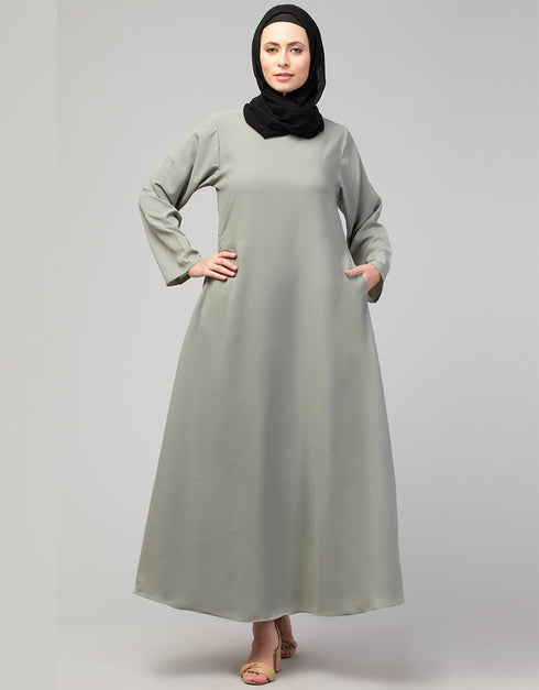 Dubai Abaya with front opening and hidden placket for everyday wear in Color Sage Green