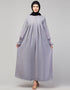 Trendy Smoking sleeve abaya with pleats at the chest for a stylish Sky Grey