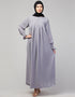 Trendy Smoking sleeve abaya with pleats at the chest for a stylish Sky Grey