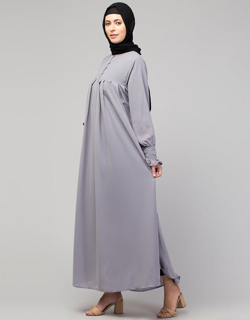 Trendy Smoking sleeve abaya with pleats at the chest for a stylish Sky Grey