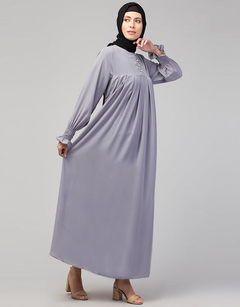 Trendy Smoking sleeve abaya with pleats at the chest for a stylish Sky Grey