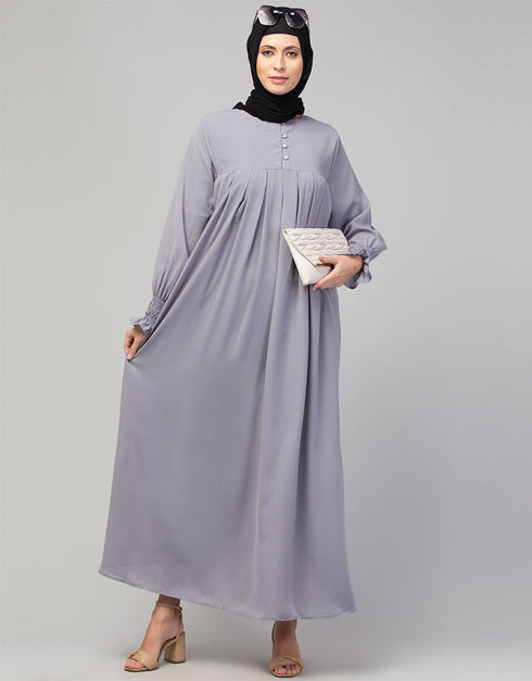 Trendy Smoking sleeve abaya with pleats at the chest for a stylish Sky Grey