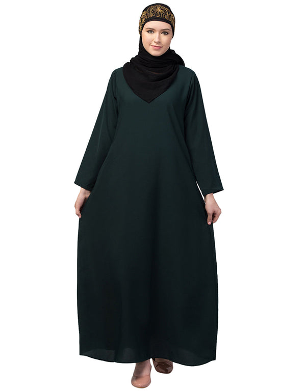 Muslim Basic abaya with a flared hem for a relaxed and stylish look In Color bottle green